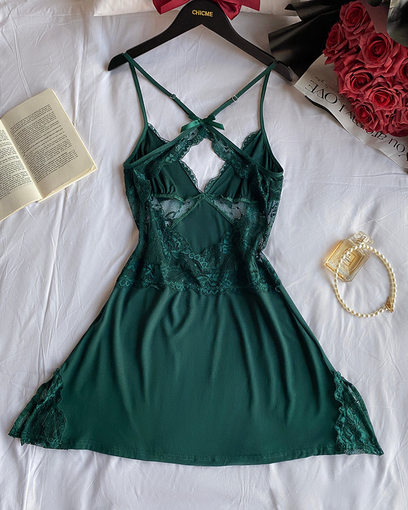 The KOAD'CLO V-neck babydoll sleep dress features lace trim and a crisscross side slit.