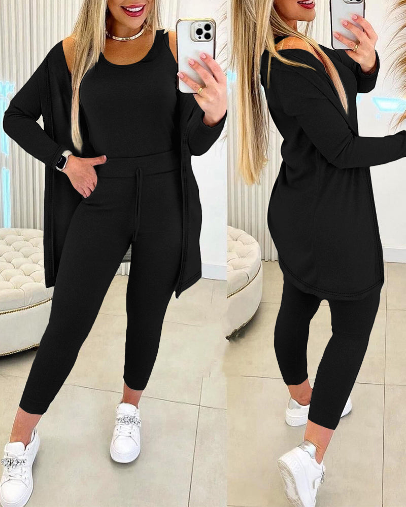 Black 3-piece lounge set featuring a tank top, long sleeve coat, and pants.