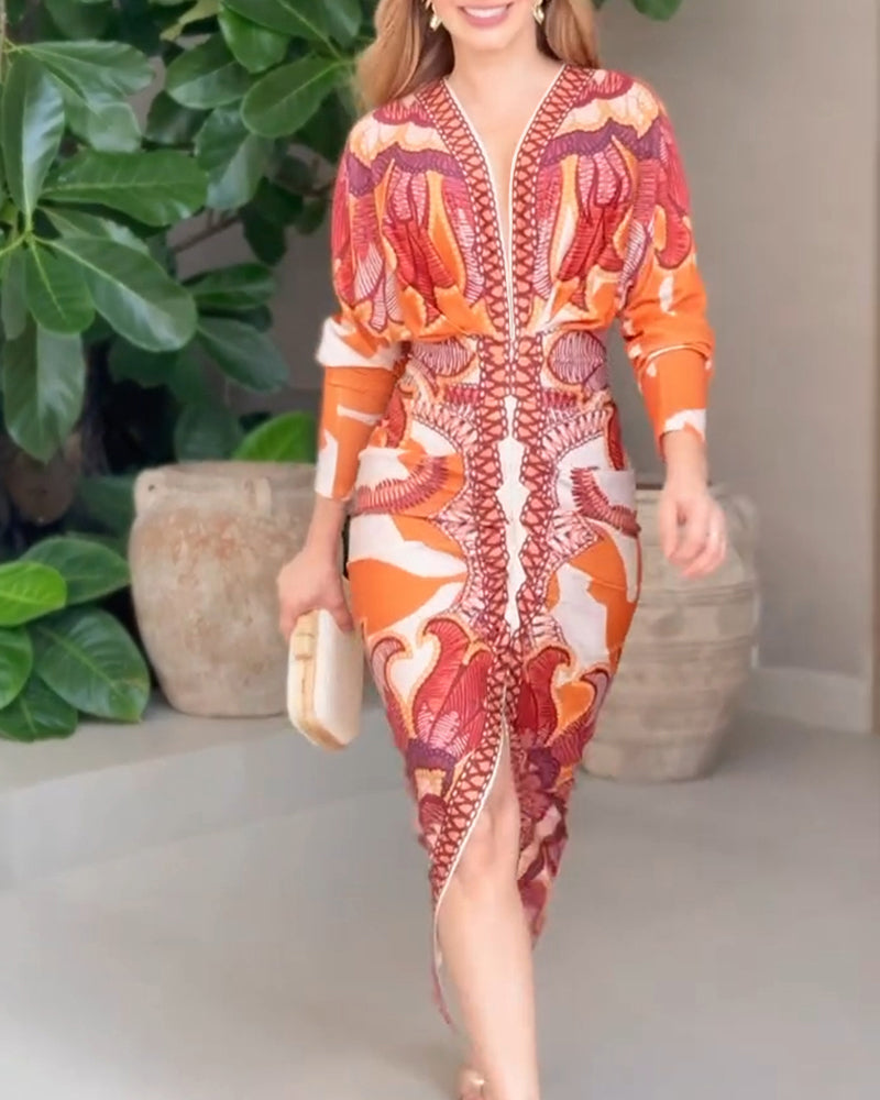 Baroque-inspired deep V-neck bodycon dress with long sleeves, slit, and vibrant abstract patterns.