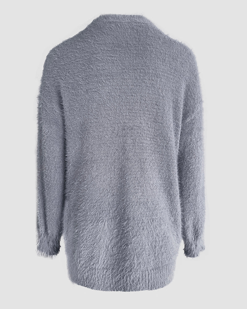 Light gray fuzzy cardigan with V-neck, single breasted front, long sleeves, and relaxed fit.