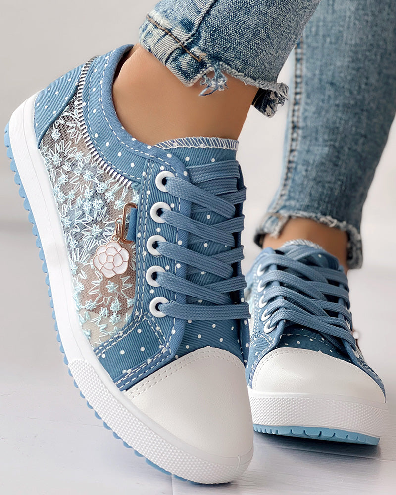 KOAD'CLO Floral Embroidered Polka Dot Print Sneakers with white toe caps and light blue ripped jeans.