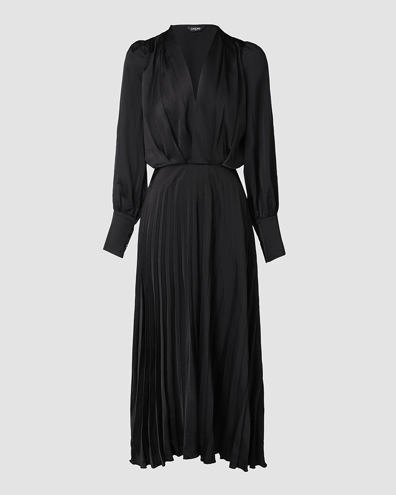 Black pleated maxi dress with elegant puff sleeves and a V-neck, no belt.