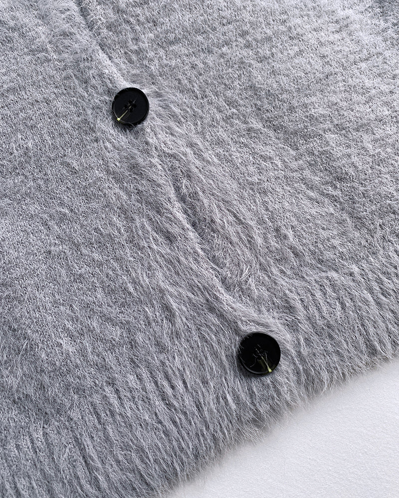 Grey V-neck single-breasted fuzzy cardigan with two black buttons and minimalist style.