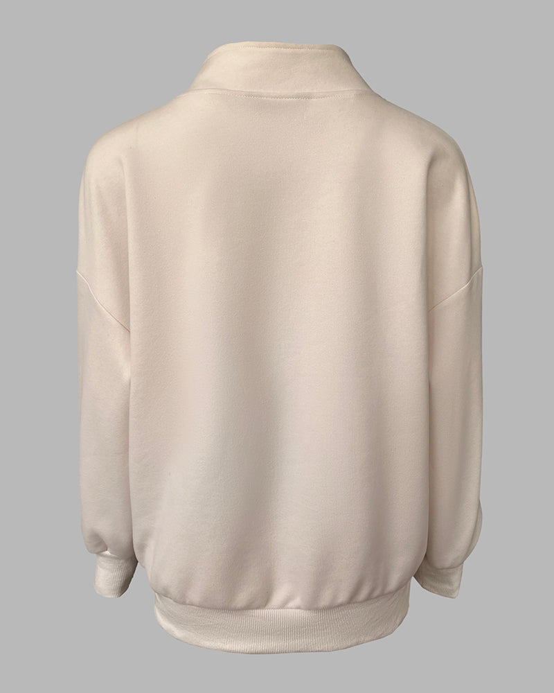 Light beige high-neck half-zip sweatshirt with kangaroo pocket, drop shoulders, ribbed cuffs and hem.