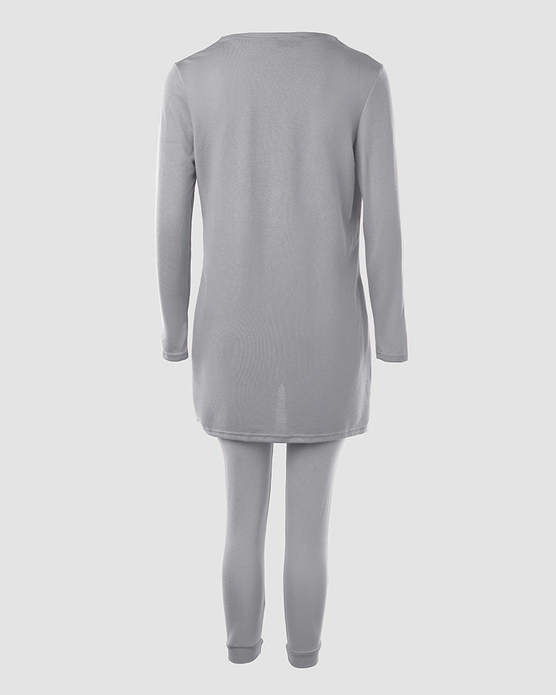 Light gray tank top, long sleeve coat, and pants shown together from the back.