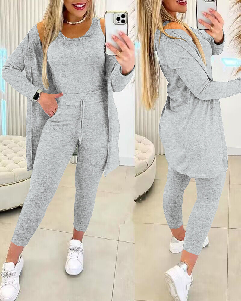 Light gray tank top, long sleeve coat, and pants from KOAD'CLO Lounge Set.