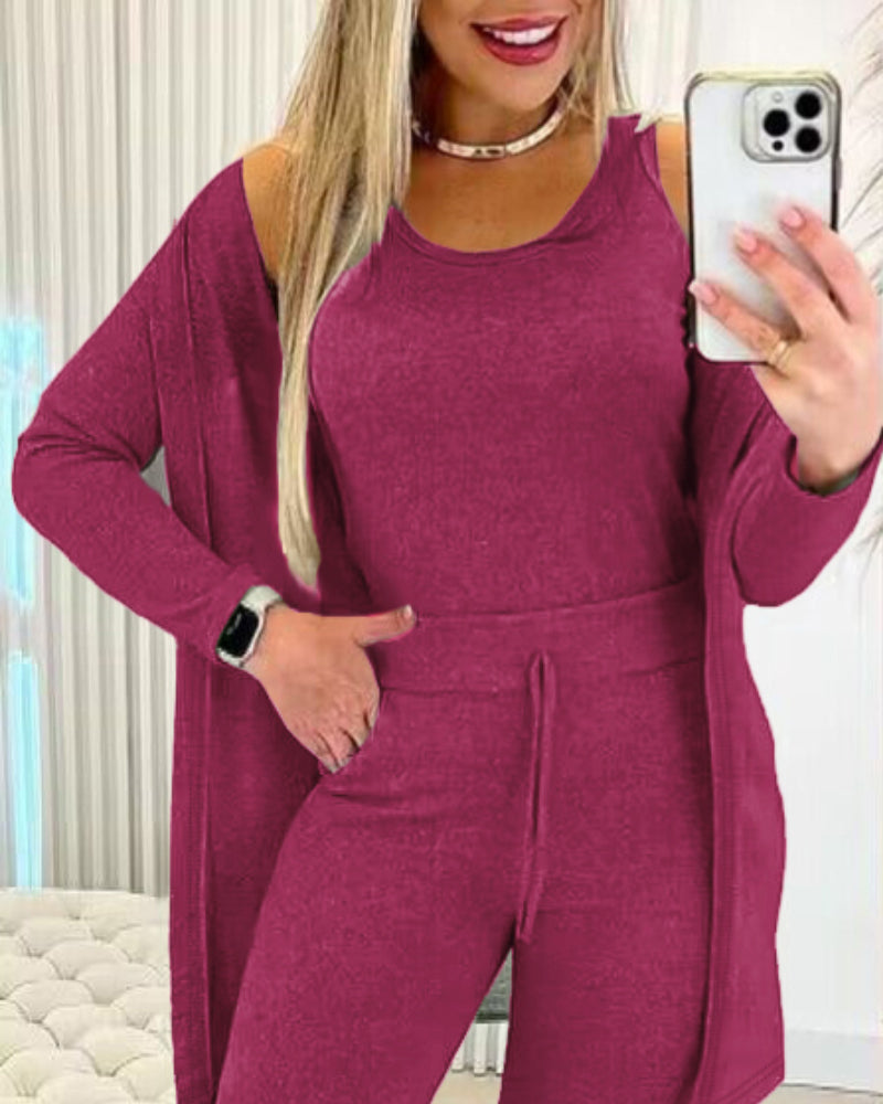 A magenta KOAD'CLO three-piece set: tank top, long sleeve coat, and pants.