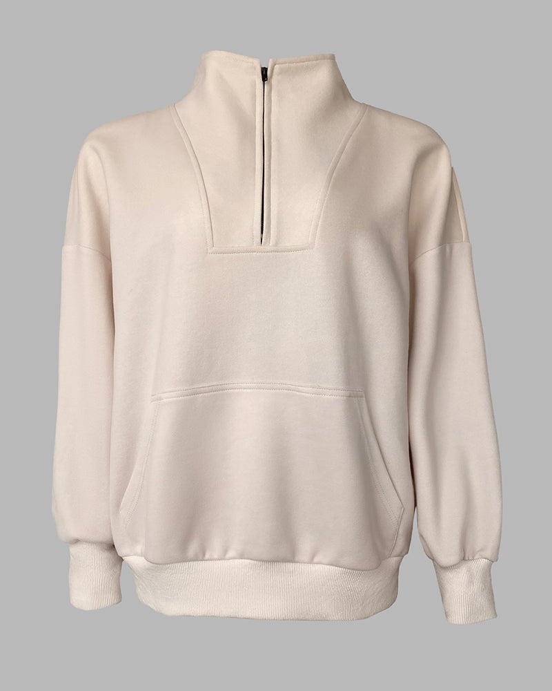 Light beige half-zip sweatshirt with high neck, kangaroo pocket, drop shoulders, ribbed trim.