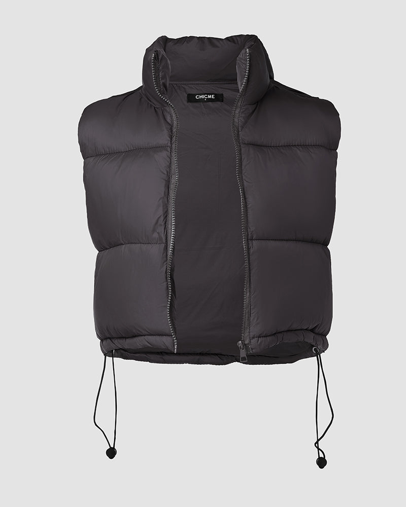 A black, sleeveless cropped puffer vest with stand collar, zip front, and drawstring hem.