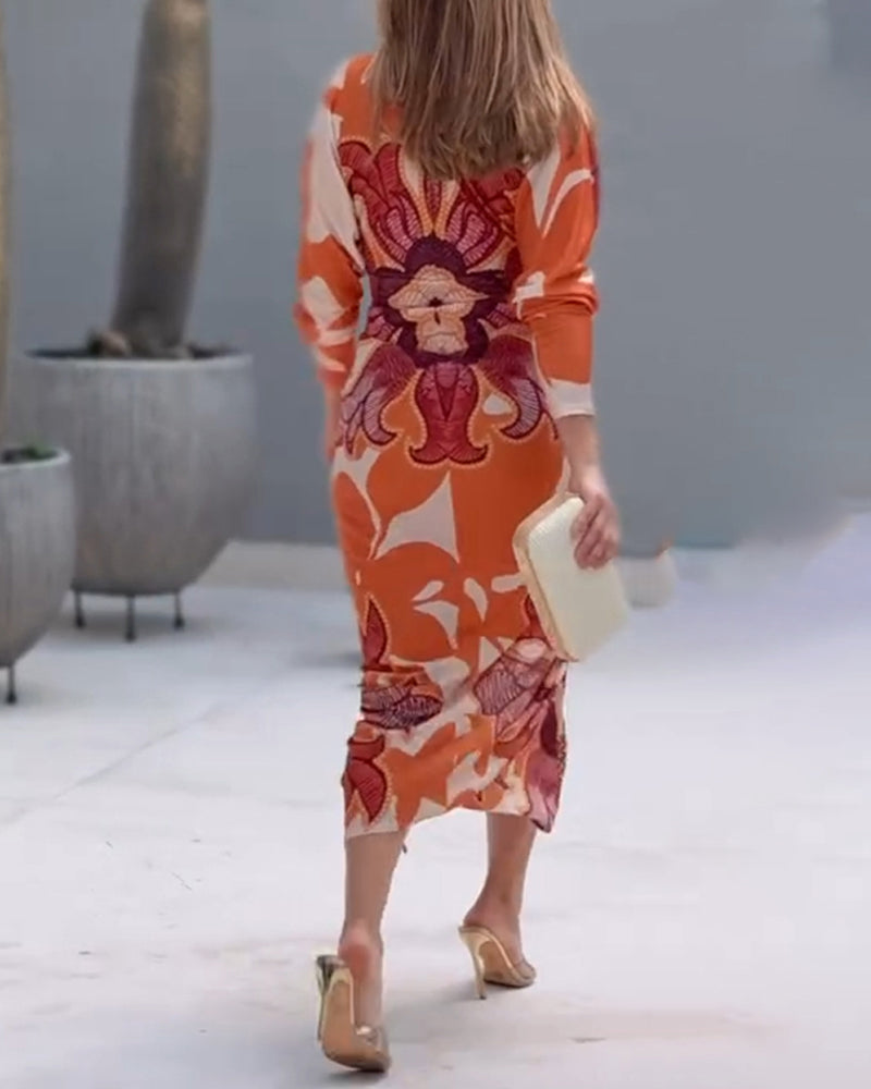 A Baroque-inspired deep V-neck bodycon dress with long sleeves and a slit.