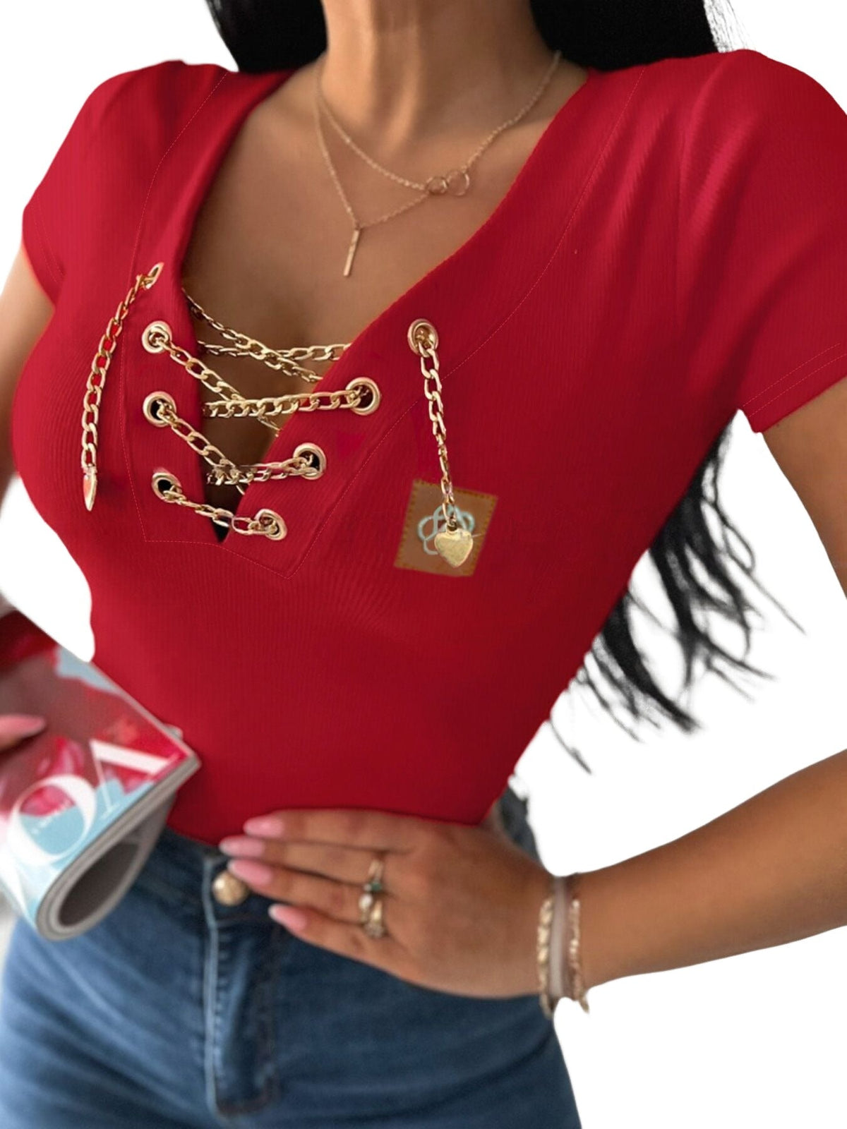 KOAD'CLO V-Neck T-Shirt with lace-up detail and rhinestone accents, blue jeans.