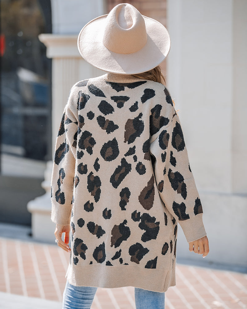 A Leopard Print Longline Cardigan with an open front design and black and brown spots.