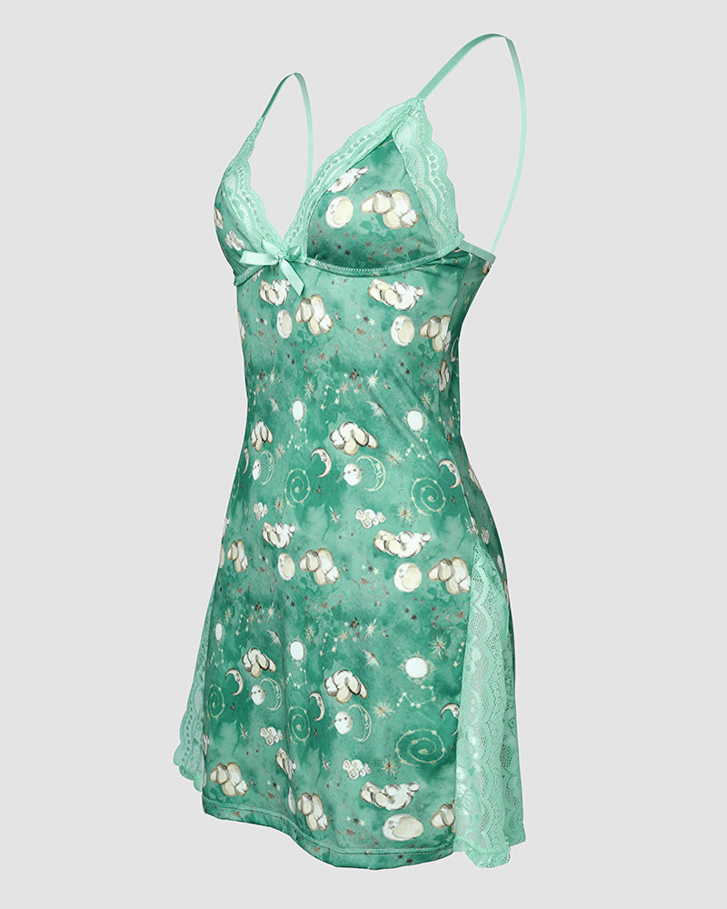 A mint green sleeveless nightdress with lace trim, bowknot, and sheep-moon-star graphics.