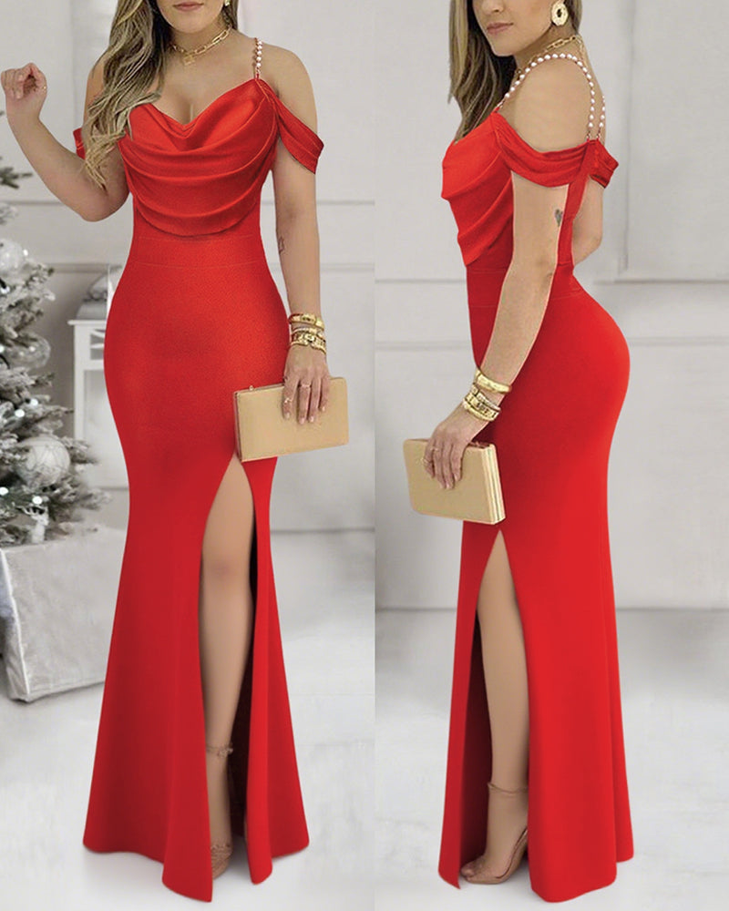 bodycon maxi dress with pearl straps, cowl neck, and high slit.