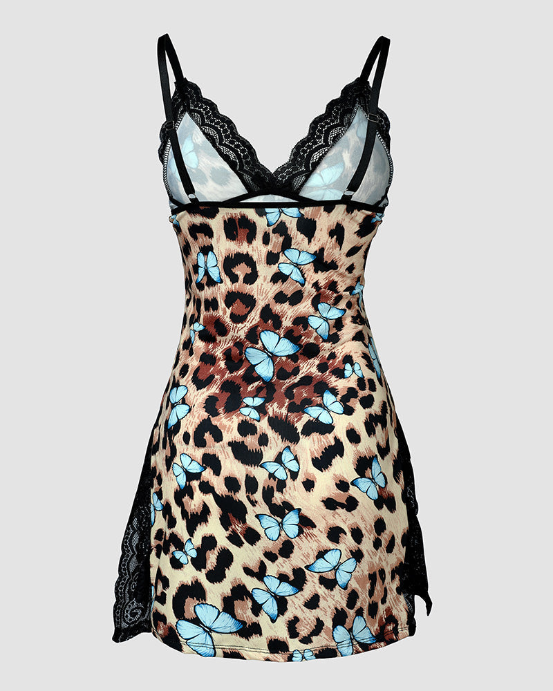 Sleeveless dress with leopard print, butterfly patterns, black lace trim, and spaghetti straps.