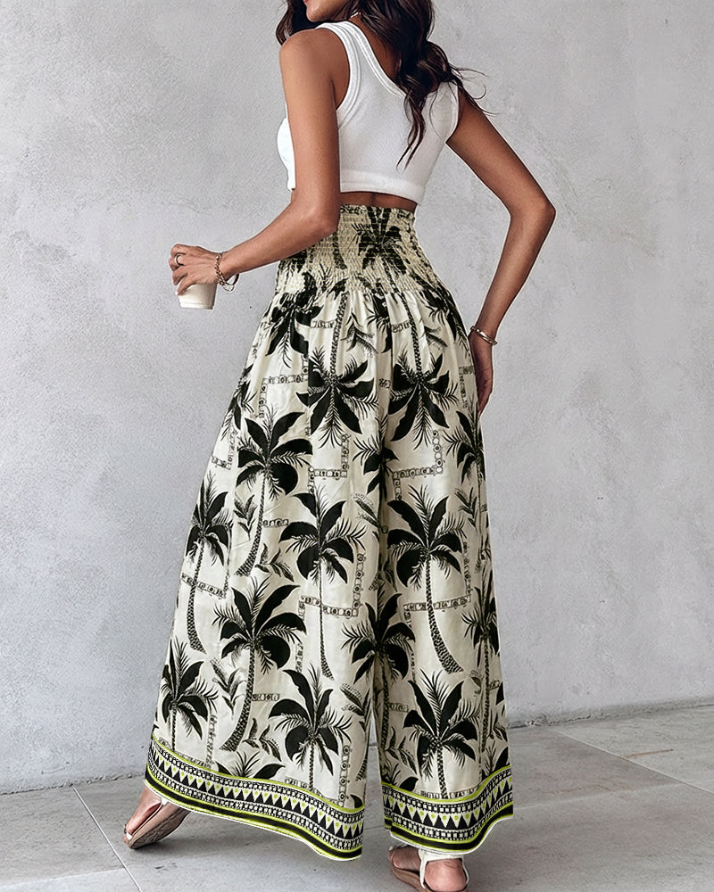 White sleeveless crop top and KOAD'CLOKOAD'CLO vintage floral high waist shirred wide leg pants.