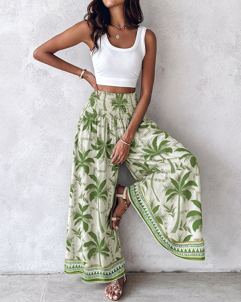 KOAD'CLOKOAD'CLO Vintage Floral High Waist Shirred Wide Leg Pants and a white crop top.
