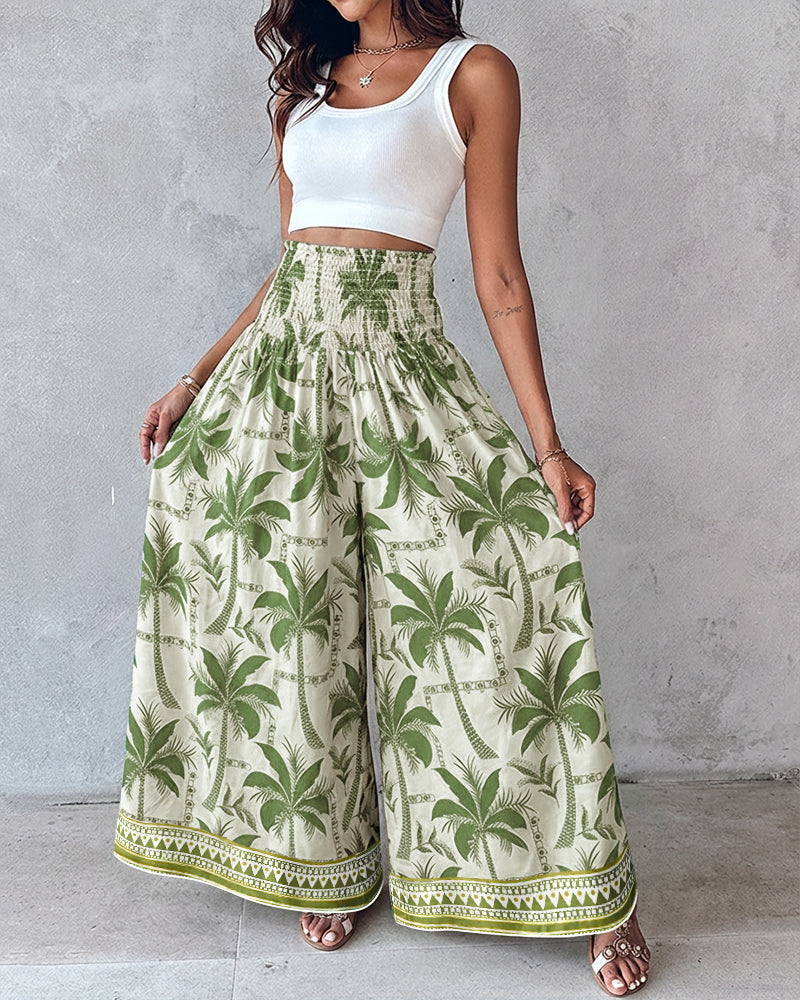 KOAD'CLOKOAD'CLO Vintage Floral High Waist Shirred Wide Leg Pants with a white crop top.