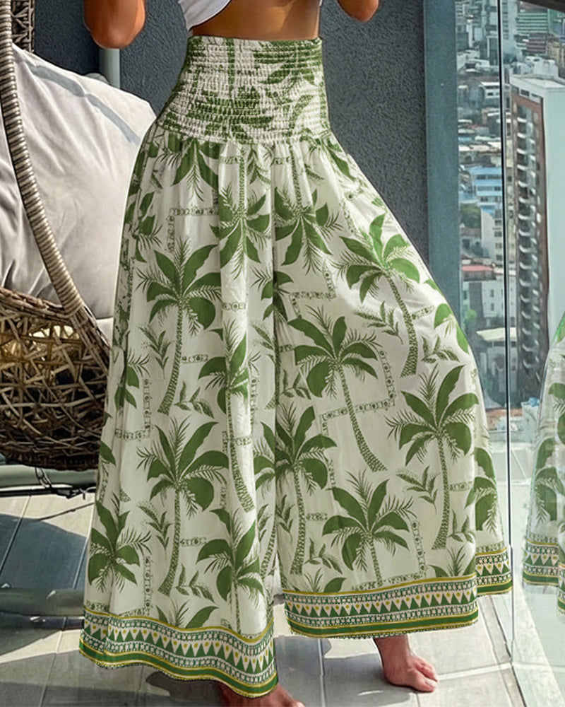 KOAD'CLOKOAD'CLO Vintage Floral High Waist Shirred Wide Leg Pants with green palm tree print.
